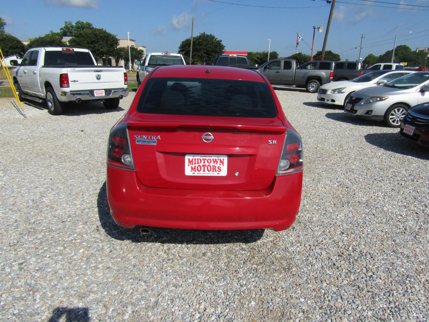 2012 Red /Gray Nissan Sentra 2.0 (3N1AB6AP4CL) with an 2.0L L4 DOHC 16V engine, Automatic transmission, located at 15016 S Hwy 231, Midland City, AL, 36350, (334) 983-3001, 31.306210, -85.495277 - Photo#6